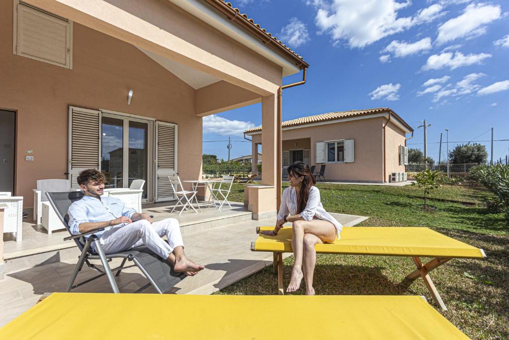 Posezení v ubytování Milocca Homes