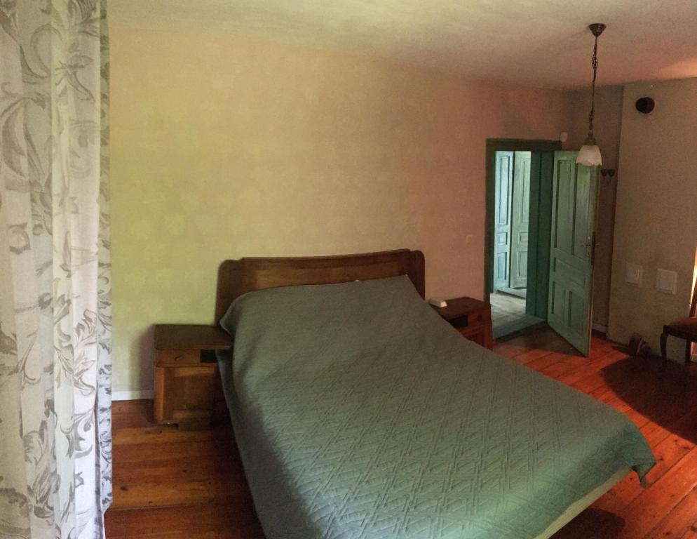Ένα ή περισσότερα κρεβάτια σε δωμάτιο στο "Maroli House"