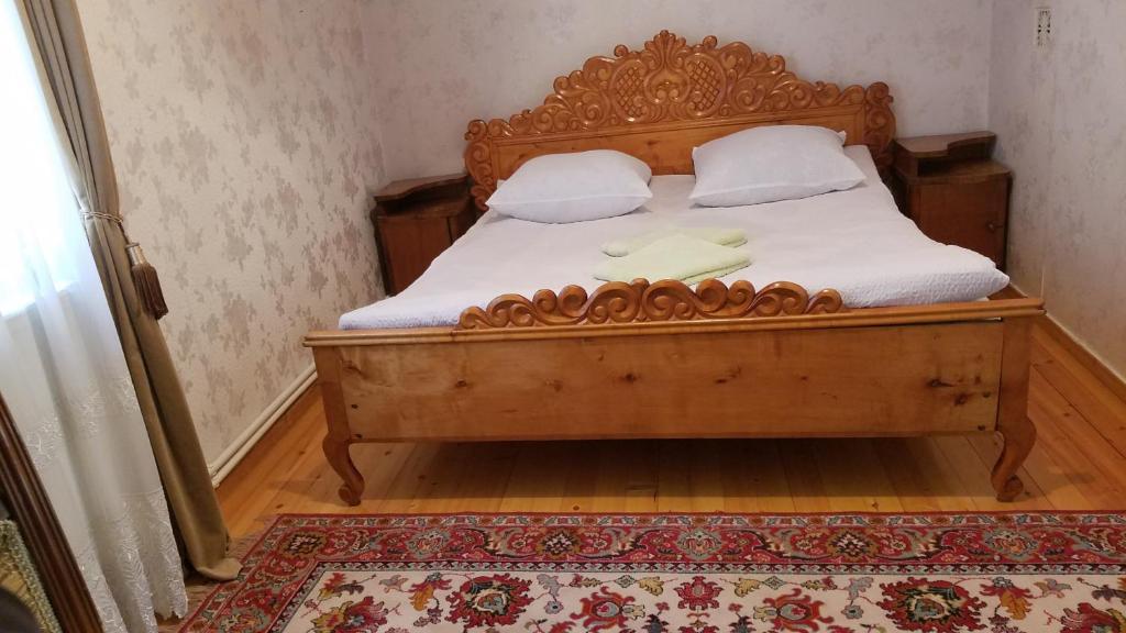 Postel nebo postele na pokoji v ubytování Guest House Green Rose
