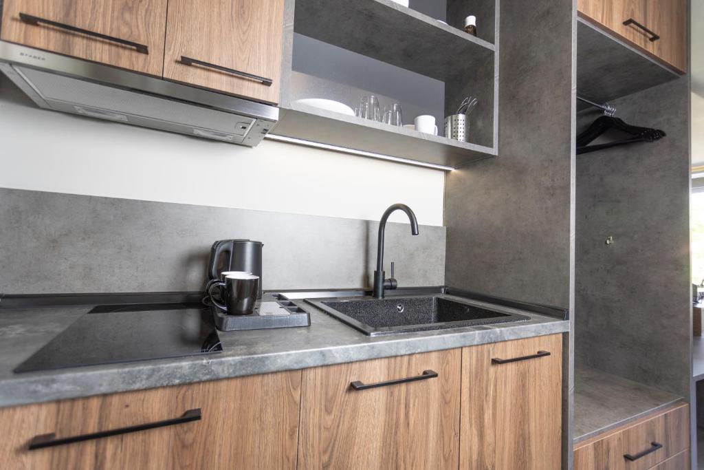 Notos Premium Holiday Apartments - 9