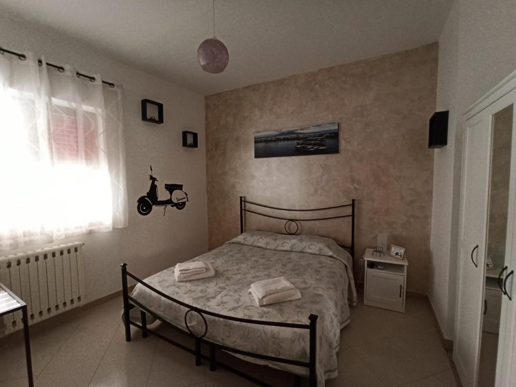 Postel nebo postele na pokoji v ubytování B&B In Sella