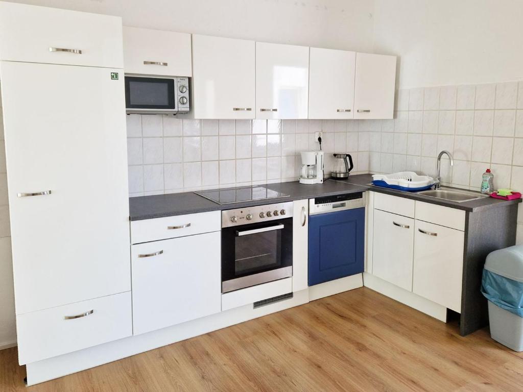 Dapur atau dapur kecil di Work & Stay Apartments in Leverkusen