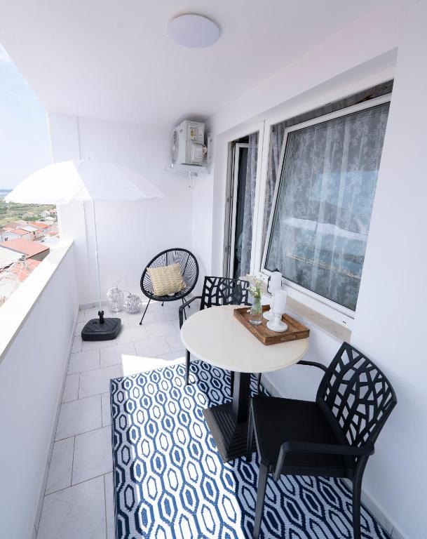 Posezení v ubytování L'infini Sea View apartments Zubovići