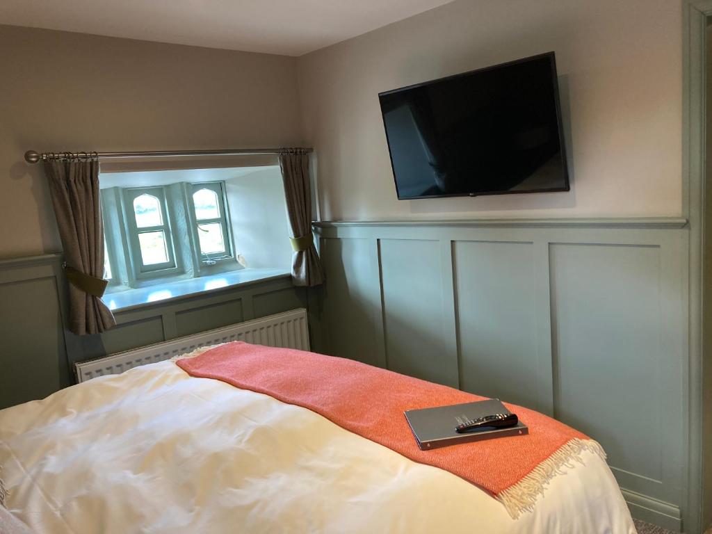 Letto o letti in una camera di The Stork Hotel
