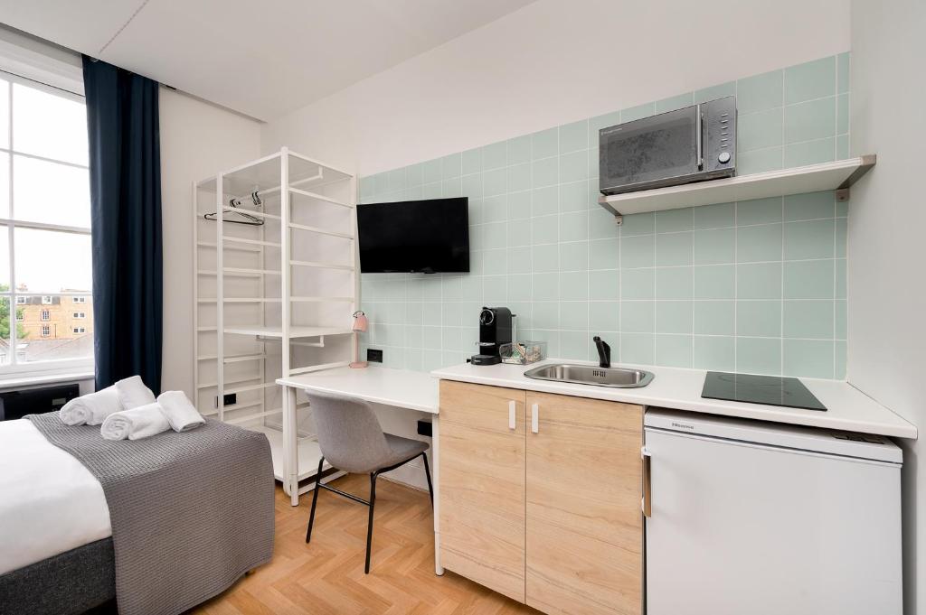 TV a/nebo společenská místnost v ubytování D8 House