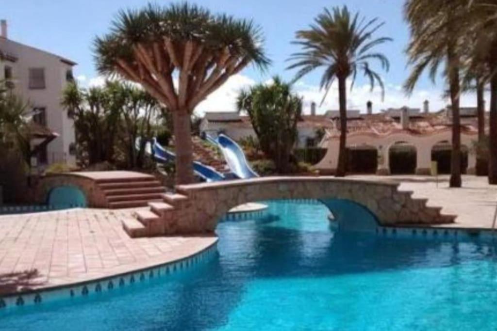 En Denia, urbanización el palmar con piscina, toboganes y ...