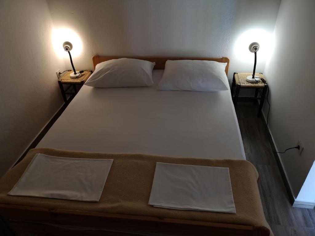 Postel nebo postele na pokoji v ubytování Apartments MINT Povljana - 50m from sandy beach