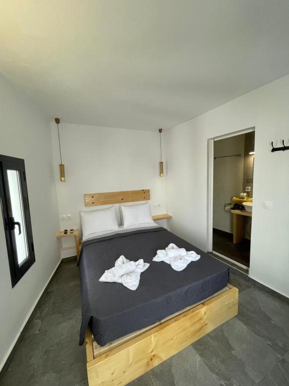 Ein Bett oder Betten in einem Zimmer der Unterkunft Sun Springs Suites