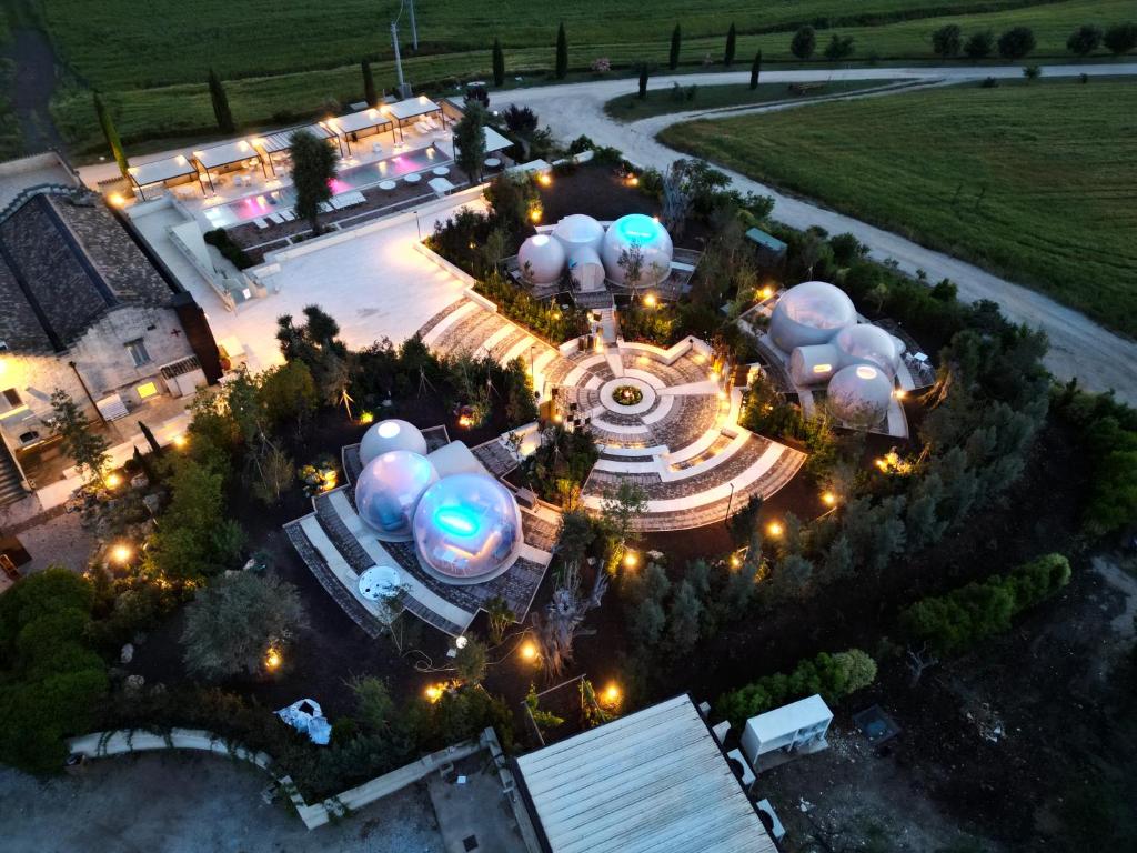 an overhead view of a space station at night at Tenuta Danesi & Bubble Rooms in Matera