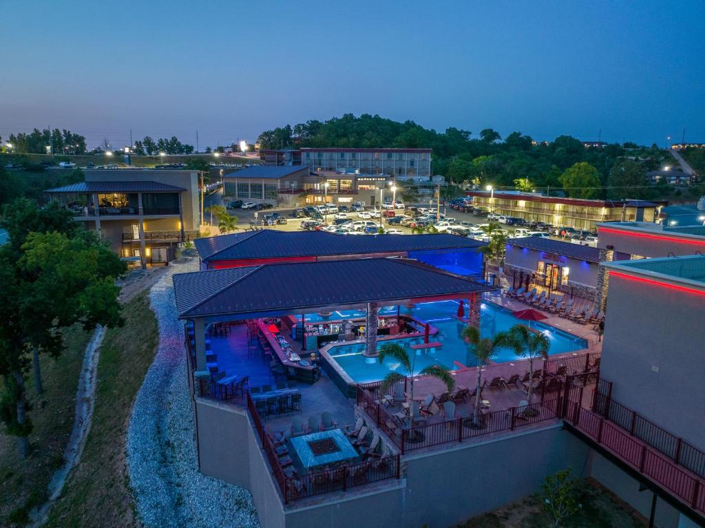 an aerial view of a hotel with a pool at The Resort at Lake of the Ozarks in Lake Ozark