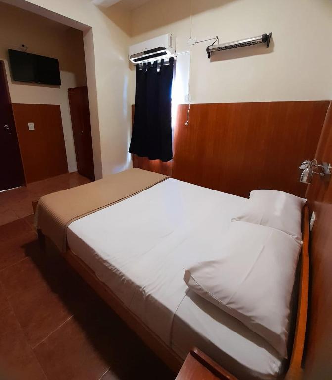 Postel nebo postele na pokoji v ubytování Hotel Vanderloo