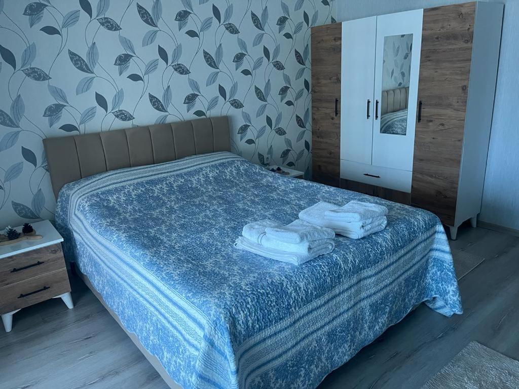 Postel nebo postele na pokoji v ubytování Eryaman, Wide Luxury Rezidance