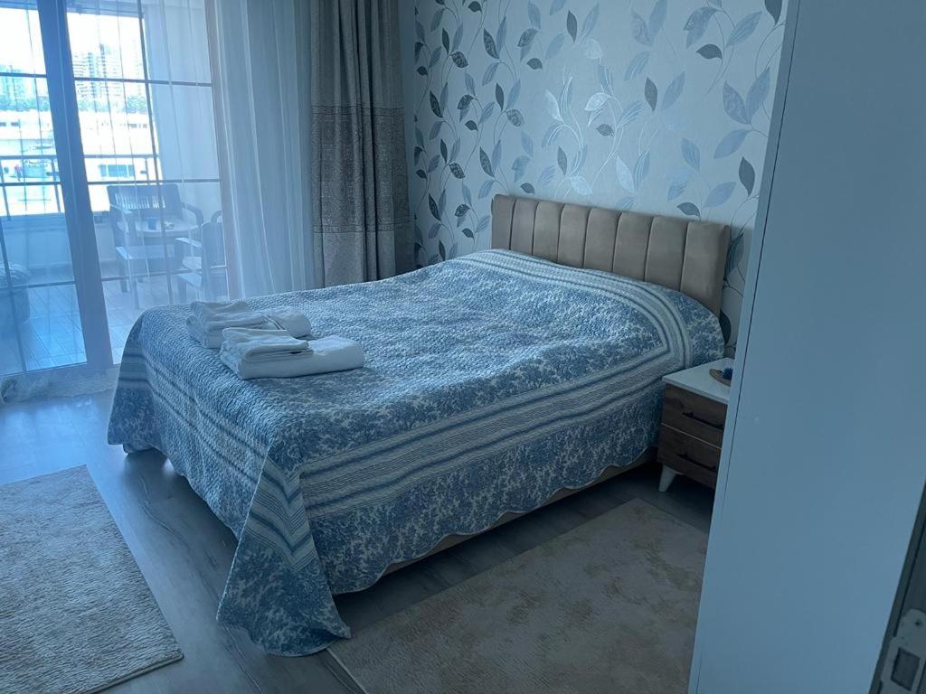 Postel nebo postele na pokoji v ubytování Eryaman, Wide Luxury Rezidance