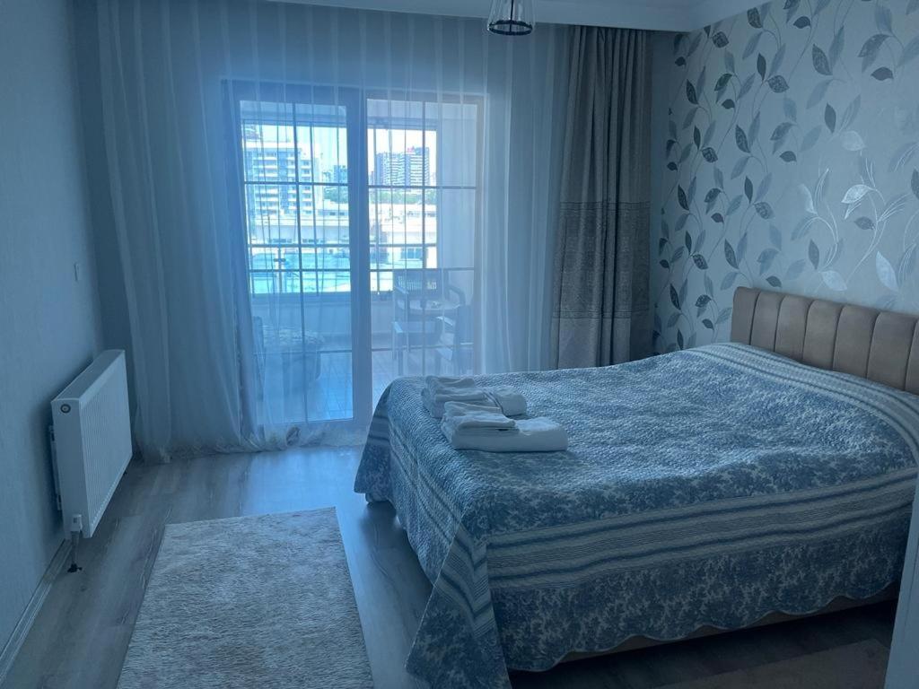 Postel nebo postele na pokoji v ubytování Eryaman, Wide Luxury Rezidance