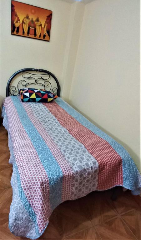 Letto o letti in una camera di Carlos Guest House 2 Cusco