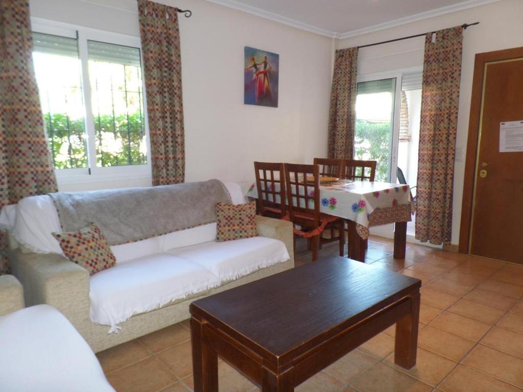 Posezení v ubytování DUPLEX AL ANDALUS THALASSA
