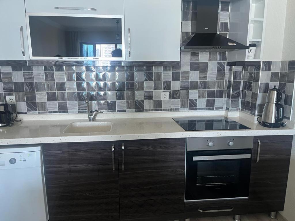 Kuchyň nebo kuchyňský kout v ubytování Eryaman, Wide Luxury Rezidance