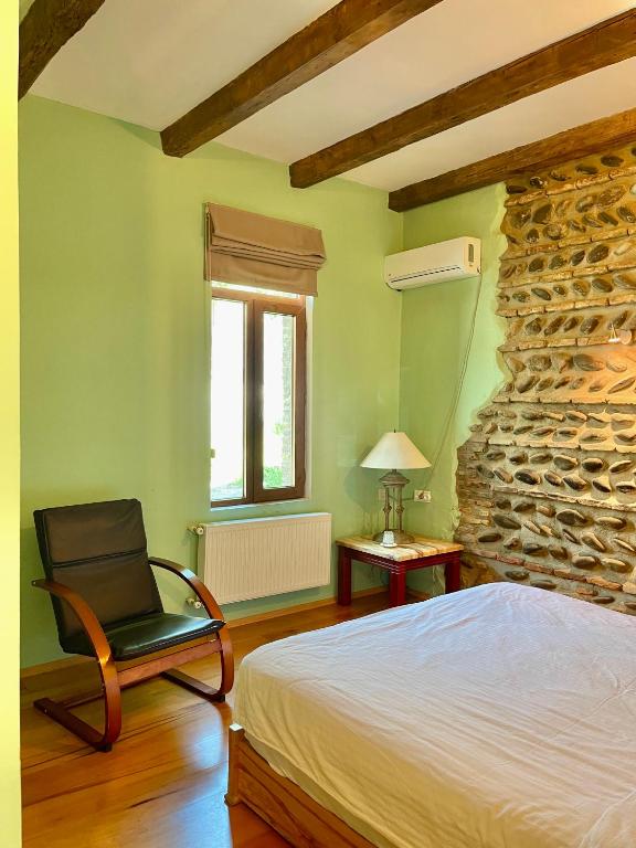 Postel nebo postele na pokoji v ubytování Guest House Savane