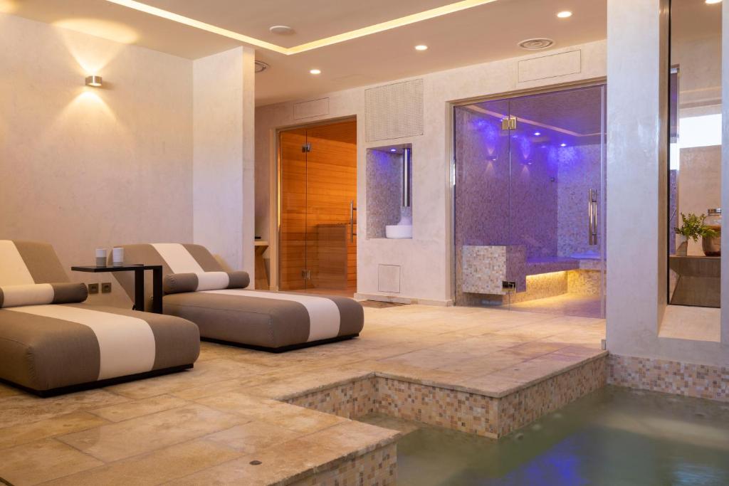 Posezení v ubytování Les Regalia Hôtel & Spa