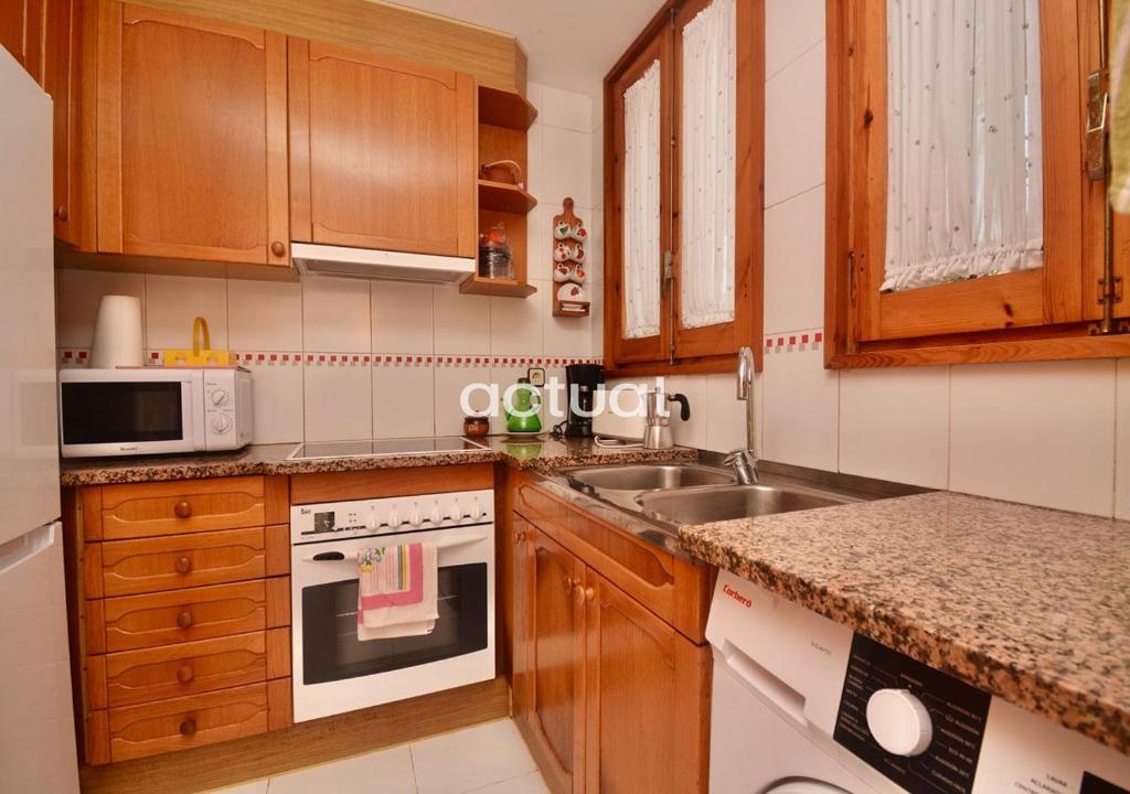 A kitchen or kitchenette at LAS GAVIOTAS 13