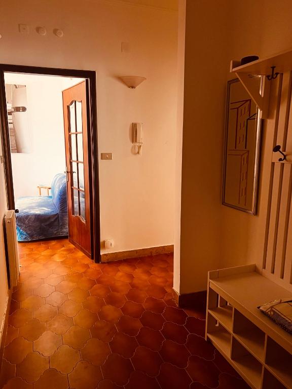 Postel nebo postele na pokoji v ubytování Condominio Ulivi