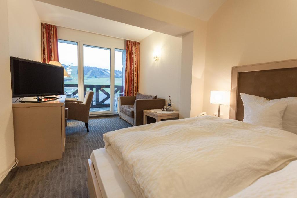 Postel nebo postele na pokoji v ubytování Hotel Magdalenenhof inklusive MeineCardPlus