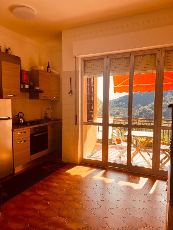 Kuchyň nebo kuchyňský kout v ubytování Condominio Ulivi