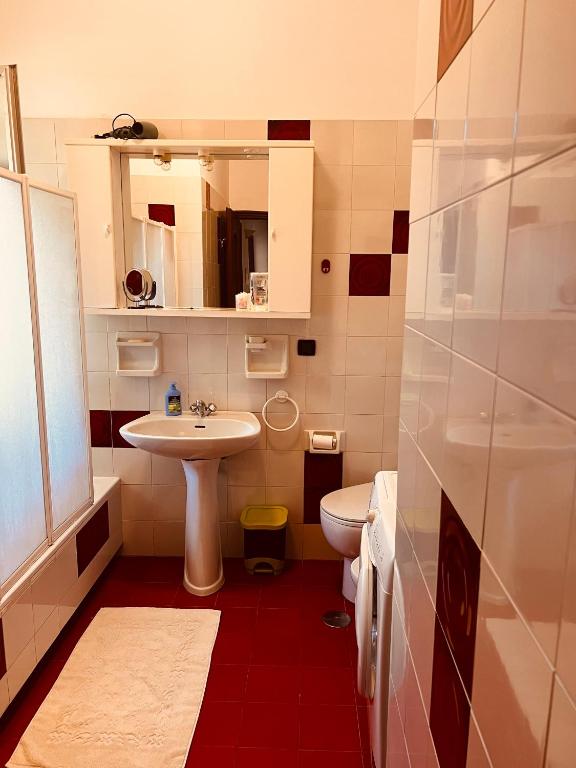 Koupelna v ubytování Condominio Ulivi