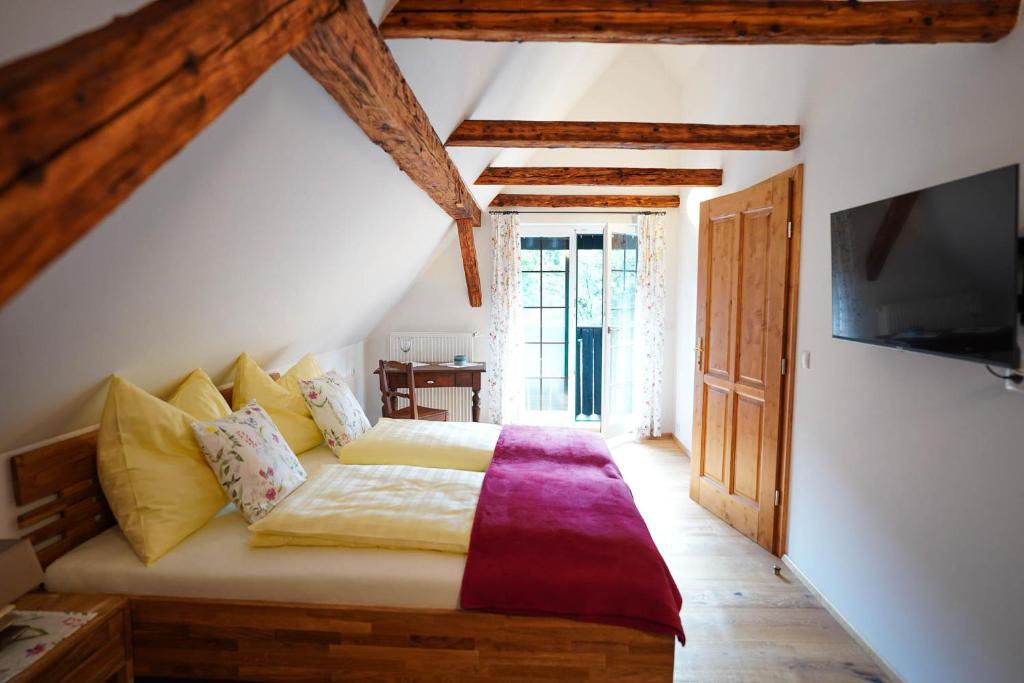Postel nebo postele na pokoji v ubytování Ferienhaus KAUSCHLERHOF