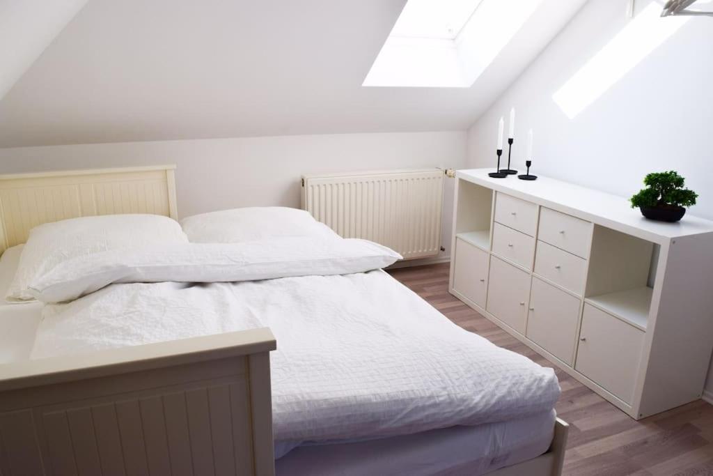 Postel nebo postele na pokoji v ubytování Wattwürmchen