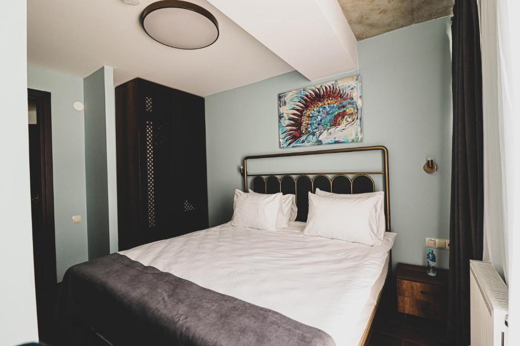 Postel nebo postele na pokoji v ubytování Paliani Hotel