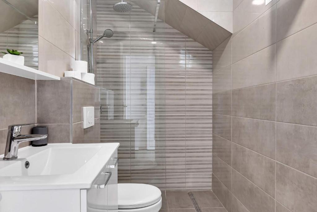 Kúpeľňa v ubytovaní Sunny Garden Apartments Ana