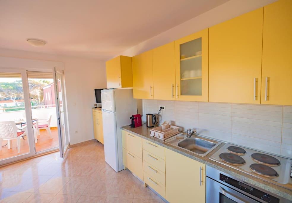 Kuchyň nebo kuchyňský kout v ubytování Apartment Vito, Pag Island