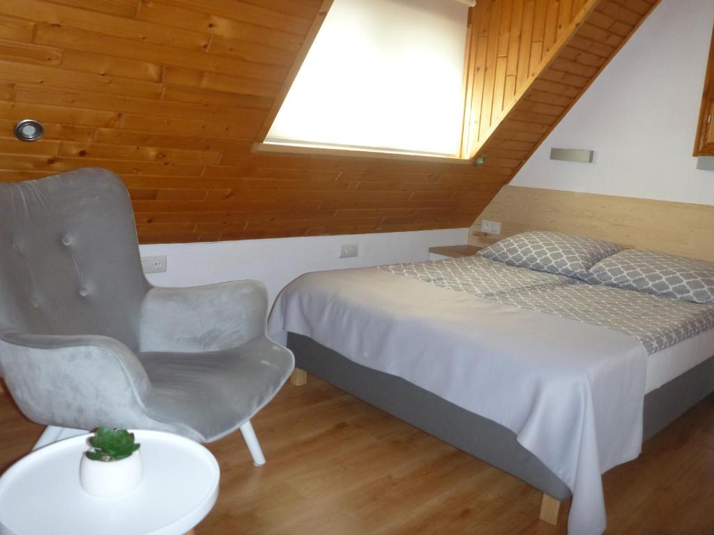 Postel nebo postele na pokoji v ubytování Willa U Jerzego