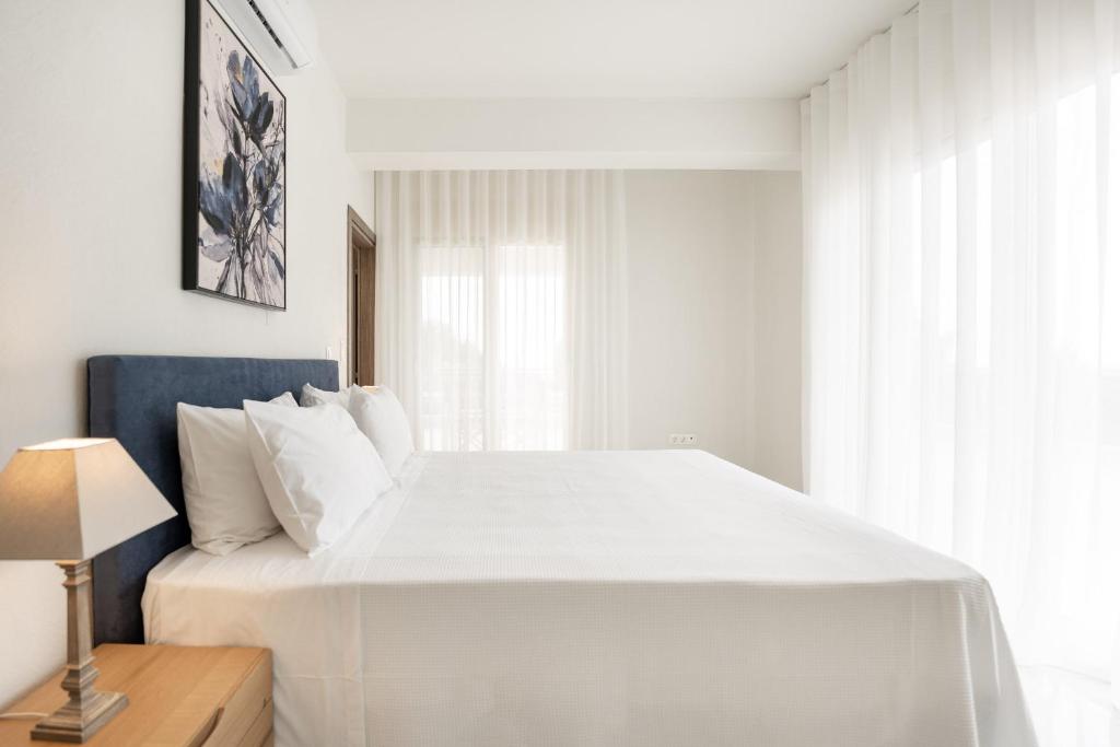Postel nebo postele na pokoji v ubytování Kalisun Exclusive Villas