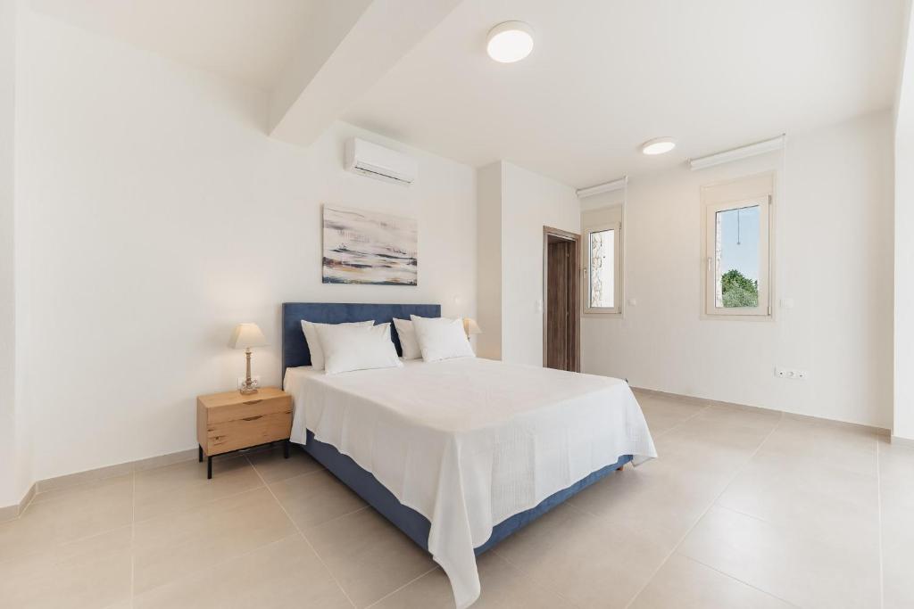 Postel nebo postele na pokoji v ubytování Kalisun Exclusive Villas