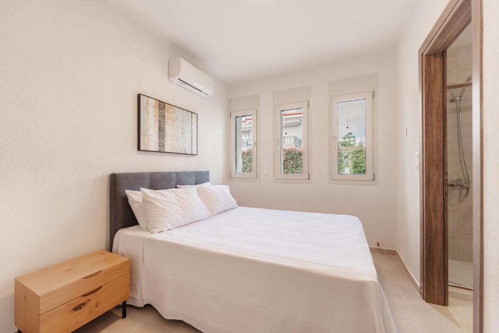 Postel nebo postele na pokoji v ubytování Kalisun Exclusive Villas
