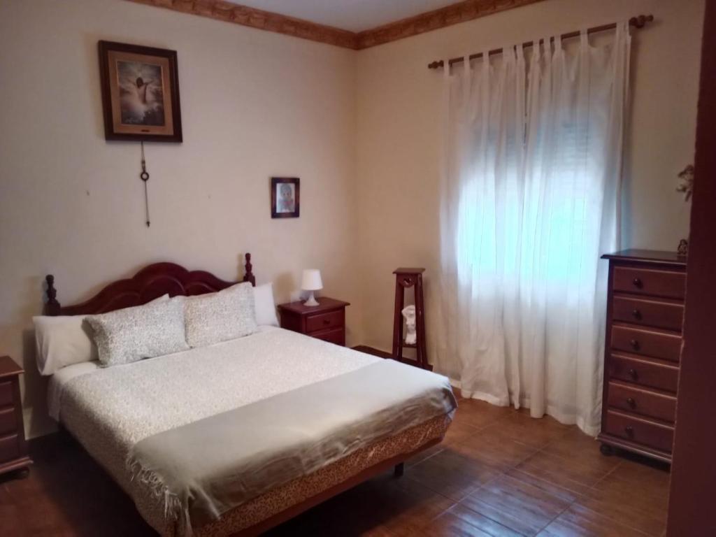 Łóżko lub łóżka w pokoju w obiekcie Chalet Villa Terry