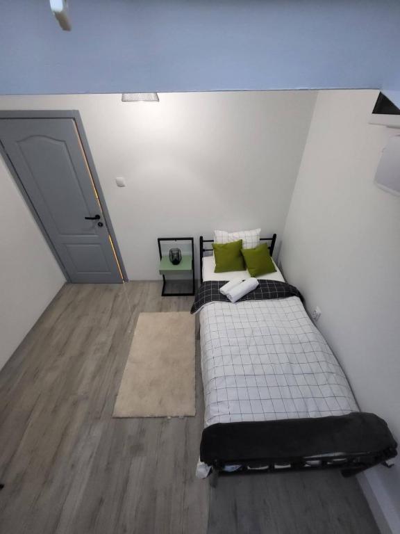 Postel nebo postele na pokoji v ubytování Villa Artisan