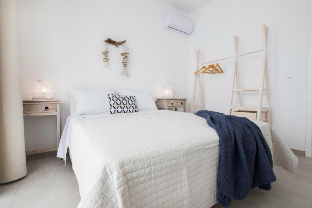 Ένα ή περισσότερα κρεβάτια σε δωμάτιο στο Bella vista Suites
