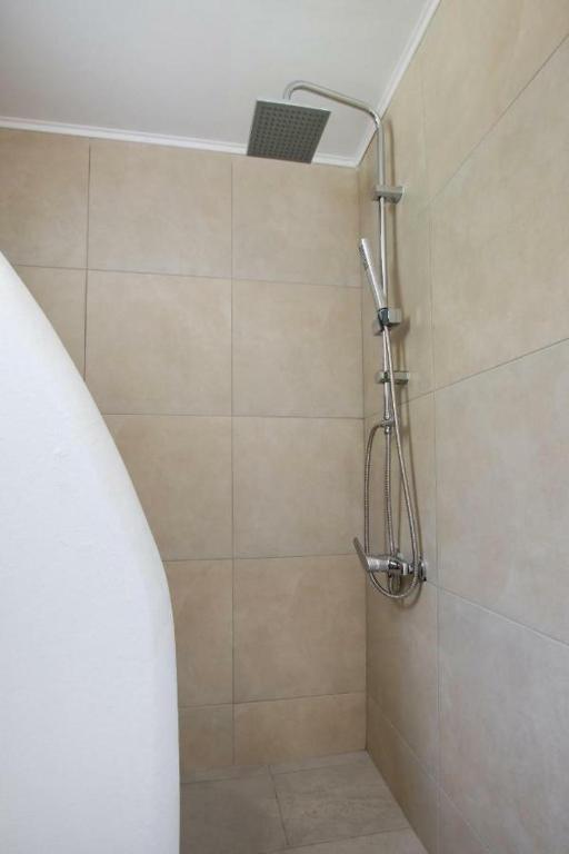 Ένα μπάνιο στο Bella vista Suites