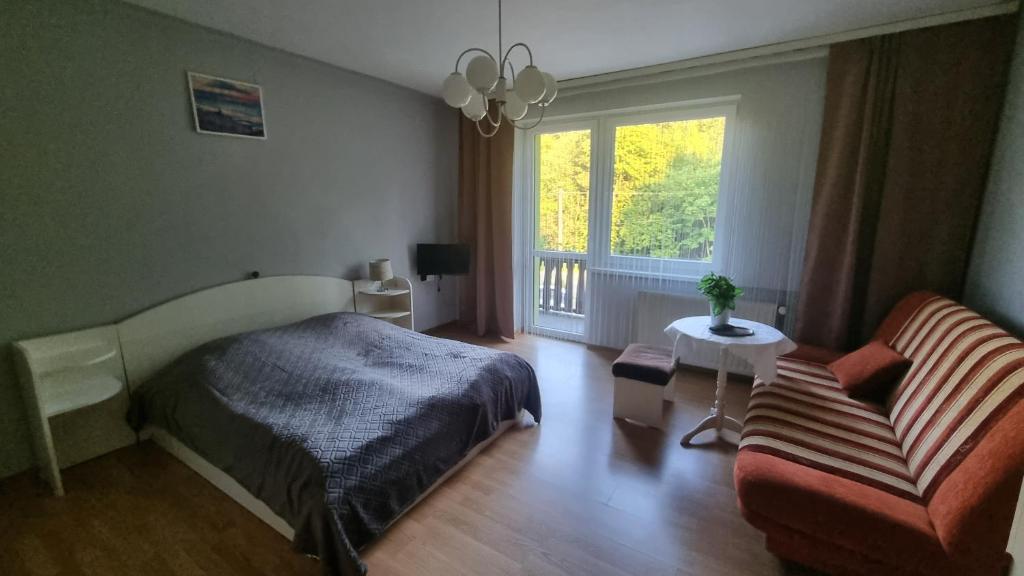 Postel nebo postele na pokoji v ubytování Alaska