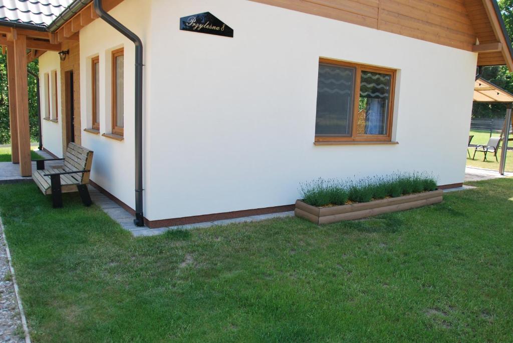 Vonkajšia záhrada v ubytovaní Forest House Sasino-SPA Sauna Balia