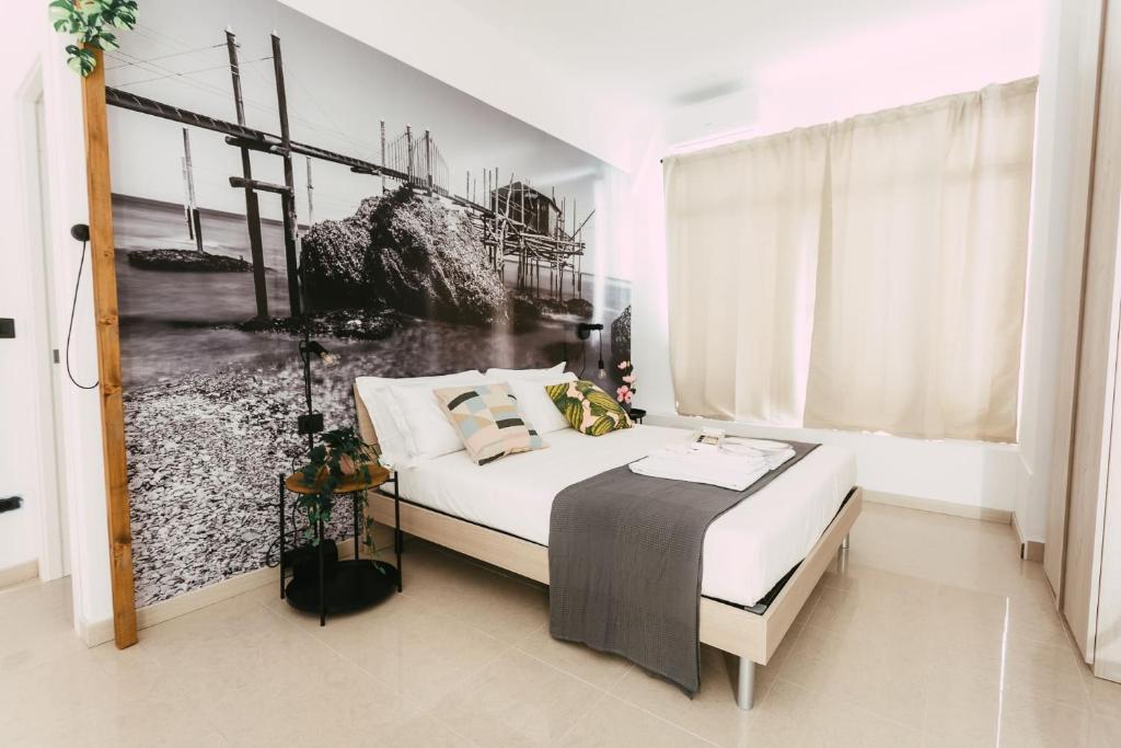 Postel nebo postele na pokoji v ubytování Le Camere ai Trabocchi