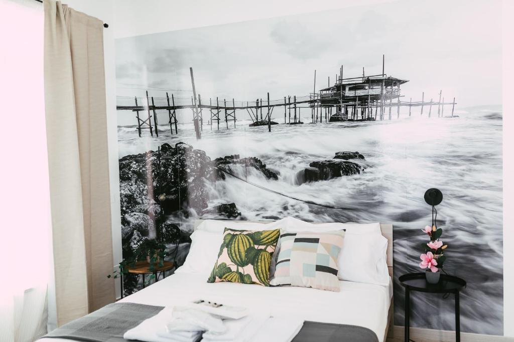 Postel nebo postele na pokoji v ubytování Le Camere ai Trabocchi