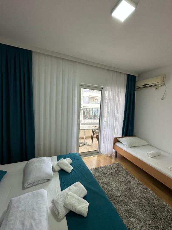 Postel nebo postele na pokoji v ubytování Molla Apartments
