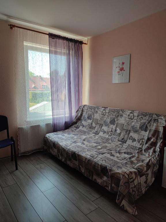 Posteľ alebo postele v izbe v ubytovaní Noce i dnie