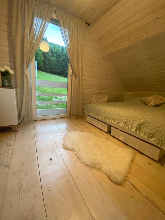 Ένα ή περισσότερα κρεβάτια σε δωμάτιο στο Forest house