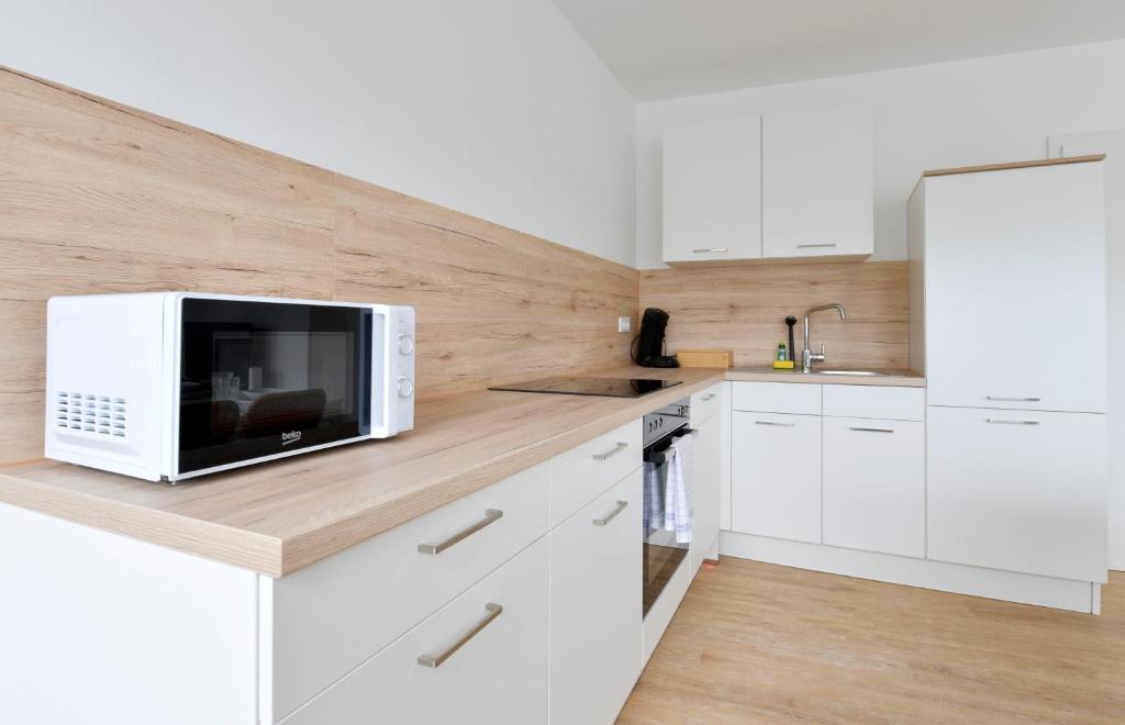 Kuchyň nebo kuchyňský kout v ubytování Stay and Work Apartment - 8 beds - 4 bed rooms