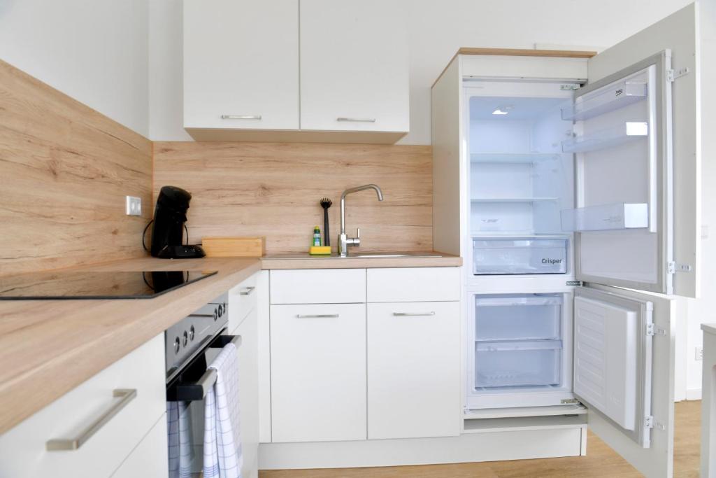 Kuchyň nebo kuchyňský kout v ubytování Stay and Work Apartment - 8 beds - 4 bed rooms